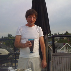 Rooftop deck enjoyment with a rather large drink ... 99% probability it was Jack Daniel's & Coke!