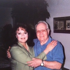 Dad & Danette saying good bye last January 2011 as Dad was leaving for Alaska.  What a smile Dad has!