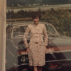 Mom taken in 1975-76 with her new car we were spending our summers in Douglastown.  Her first car.  She looks like a movie star not bad after having 9 children..