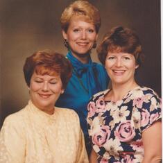 L-R: Constance "Connie" Miller and daughters, Patricia (blue blouse) and Valerie (floral blouse)