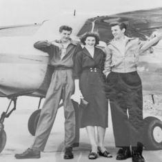 Brother John, sister Corry and Brother Cor in front of Alfred's airplane