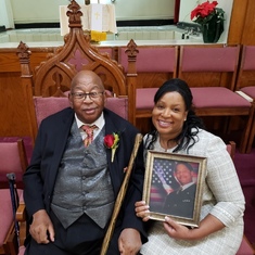 Rev. Dr. Alfred C. D. Vaughn ( Living Legend ) Pastor of Sharon Baptist Church in Baltimore, Maryland and Audra Rice, holding photo of his son Corrogan R. Vaughn