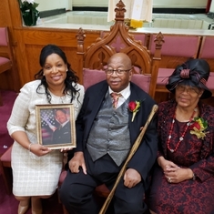 Audra Rice (holding photo of Corrogan R. Vaughn), Reverend Dr. Alfred C.D. Vaughn (Pastor of Sharon Baptist Church in Baltimore, MD) and First Lady Dr. Lillian B. Vaughn at Zion Baptist