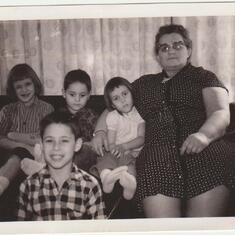What a sad bunch.  Vickie, Cos, Me, Grama Carocci and front center brother Joe