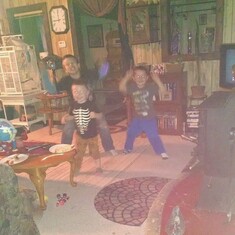 The boys jammin out in gramas living room. Louis, Carsyn and Lil Harold.