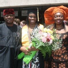 Eze and Parents at her Graduation
