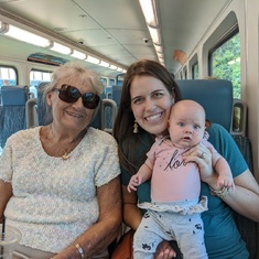 Dagmar, Bonnie (daughter-in-law) and Lily (grandchild) riding the train.