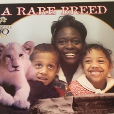 A photo from the Tampa zoo with Dakota, cousin Amanda, and Grandma J!