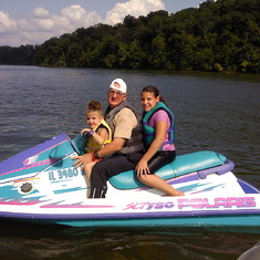 PaPa's on the lake! He loved to spend time with his family, and he loved to ride the jet ski! Loved Kinkaid Lake!