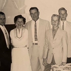 Madge and Dick Bennett with their three sons around 1952
