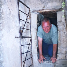 Crawling through Balcony House at Mesa Verde June 2000
