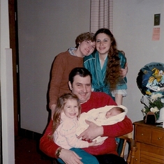 Mom (Patricia) and Dee, Dad (Larry) holding Ian and Tiffany