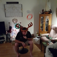 Sam and Ed played Reindeer Toss in the living room.  That's Sam being a good sport.