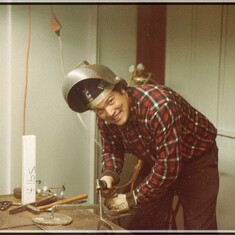 Dan welding in his shop