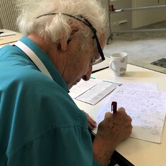 Daniel calculating during a conference in 2018.