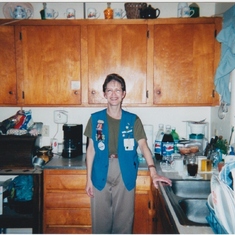 Mom dressed for work. She loved to decorate her vest with lots of pins.