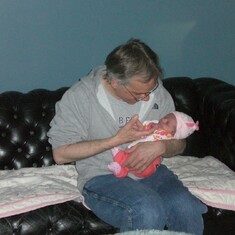 Papa holding Marlee Mei for the first time.