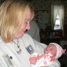 Aunt Nanny holding Marlee Mei for the first time.