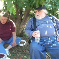 Mom and Uncle D admiring their harvest. 06/09
