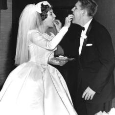 Mom & Dad  eating cake at Wedding