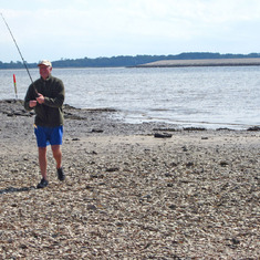 David walking over oyster shells in search of the elusive sea trout.