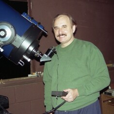 His telescope!