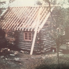 The Cabin under final construction. The cabin took about 7 years to complete. David Luce and Philip Clapp built the walls together, using logs harvested form the land and pulled with a horse. Mary Jane Luce and Mireille Clapp built the fireplace from fiel