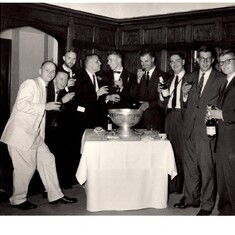 Dave in his white suit (far left), toasting the groom, Etienne Aberth (fourth from left), around the punch bowl, along with all the other wild and crazy guys at Etienne and Sally Aberth's wedding on June 27, 1959, in Rochester, N.Y.