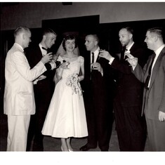 Dave in his white suit (far left) toasting the bride, Sally Stephens (now Aberth), along with her new husband, Etienne (to the right of Sally), along with other cool dudes at the wedding reception held on June 27, 1959, at Monroe Country Club in Rochester