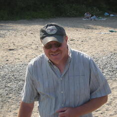 Happy Dave on a Grant Park beach walk. He's probably about to skip a stone.