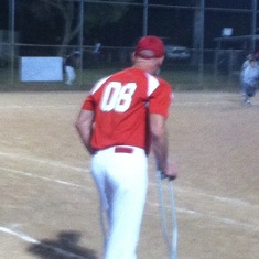 Digs Softball Game coaching first base on crutches.