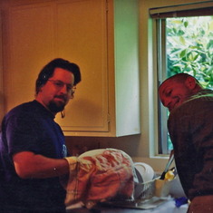 Dave doing the dishes with his college chum Tim Kostolansky