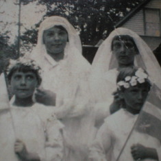 This is a picture of Mom, Leona Gauthier and her sister (or sisters) at Mom's first communion...year ??