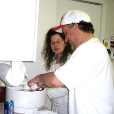 Dave teaching Lynette how to make jerky