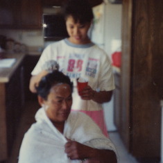 Larisa coloring Dad's hair!