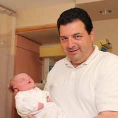 Grandpa with baby Eden on the day she was born