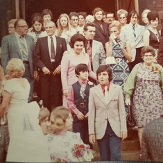 Uncle Russell Stelnicki and Aunt Jackie's wedding. Dave center bottom  with Peter on his left.