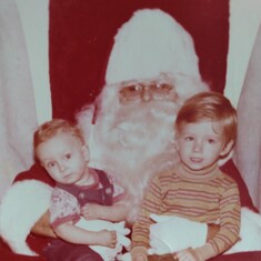 David sitting on Santa's lap.