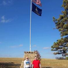 David with his oldest son Daniel at the marker for the center of the U.S.