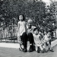 With his older three daughters on an outing