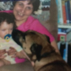 Dawn with her granddaughter and her dog Bear