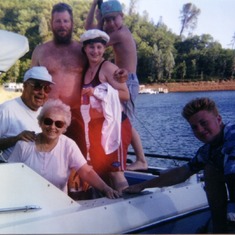 Mom & Dad boating with the Huskey Clan.