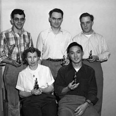Deane (on far right in back row) holding one of his many Tektronix bowling trophies.  Dad loved to bowl in his younger years!