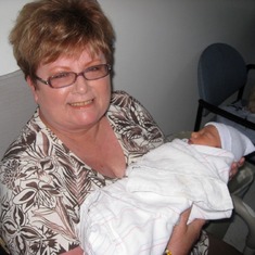 Holding grandson Noah for the first time