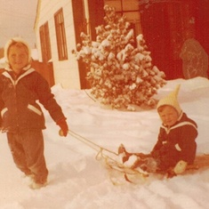 Debbie and Robin in Aurora Co sledding