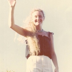 Deb waving in Oahu to Mom and Dad