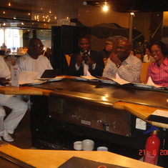 A meal  in a London restaurant with friends to celebrate Bisi and Deji's wedding