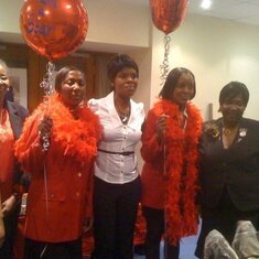 Delphine recognising her fabulous Red Jackets at a Mary Kay event