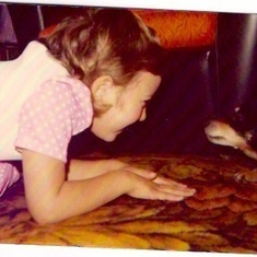 Back in England for grandma’s funeral 1976.
Playing with Tiny.