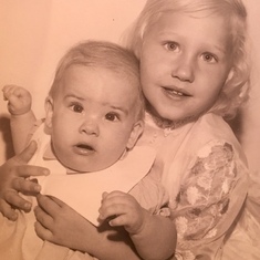 Dorain Holding Denise - a pose we never outgrew.  Denise Age 1 with Dorain age 5. 